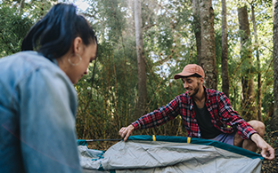 Potential Opdualag patient assembling a tent with a friend.
